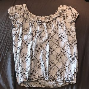 White and black floral blouse